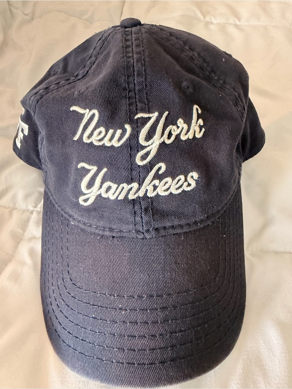 Genuine Merchandise Navy Cap with White New York Yankees Script